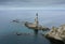 Abandoned Lighthouse Aniva on the Rock in Sakhalin Island, Russia.