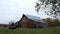 Abandoned lonely dilapidated farm barn in northern Minnesota