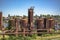 Abandoned machines and storage units in a gas industry at gas works park Seattle homes behind