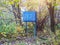 Abandoned mailbox. Abandoned blue mailbox in the forest. forest post