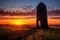 abandoned missile silo silhouette at sunset