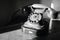 Abandoned nostalgic dial telephone in black and white