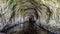 Abandoned Ocean Shore Railroad Creek Tunnel in Davenport, California, USA.