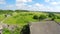 Abandoned old barn house. Broken roof. Low altitude flight. Aerial footage.