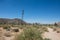 Abandoned old fashioned windmill sits along the trail to the Wall Street Mill in the desert