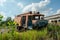 Abandoned old fire engine during summer in the lost forgotten village