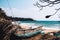 Abandoned old fishing boat on the beach. Deserted landscape on an isolated island. Forgotten and lonely near the seashore.