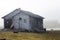 Abandoned old hunting house in tundra of Novaya Zemlya archipelago