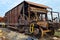 Abandoned old rusty freight industrial wagon on a factory railroad at sunny day