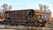 Abandoned old rusty freight wagon on a railroad at day