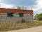 Abandoned one-storey brick building