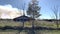 An abandoned overgrown church on a rural country road