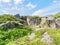 Abandoned, overgrown millstone quarry in the Derbyshire Peak District