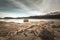 Abandoned and partially submerged stone building in lake in Corsica