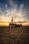 Abandoned Pier At Lytham Beach With Dramatic Sunset.