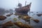 abandoned pirate ship wreck on a foggy coastline