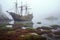 abandoned pirate ship wreck on a foggy coastline