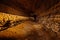 Abandoned prospecting adit. Tunnel at limestone at abandoned mine