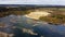 Abandoned quarry view from above . Water in the quarry. Journey. An article about forgotten careers.