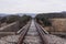 Abandoned Railroad Bridge - Track View on Cloudy Afternoon