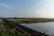 Abandoned railway over farm