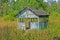 Abandoned recreation center, single blue wooden building, chernobyl area zone,