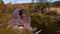 Abandoned Red Barn Overhanging in Creek - New York