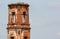 Abandoned red brick bell tower of old church