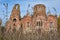 Abandoned red brick Christian church in depths of Russia, abandoned building in wilderness