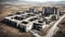 abandoned ruined concrete brutalist building complex in desert landscape