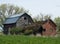 Abandoned ruined house and barn