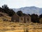 Abandoned run-down house ruins brick stone walls of goldmining settlement Welshtown Bendigo in Central Otago New Zealand