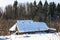 abandoned rustic house at the edge of forest