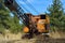 Abandoned Rusting Antique Orange and Black Crane