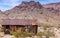 Abandoned rusty metal shed in Eldorado mountains, Nelson Nevada USA