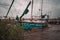 Abandoned sailboat ship wrecked on a Texas lake