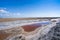 Abandoned salt beach with incredible beautiful iron red color bittern, only can be seen in drought time