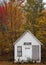 Abandoned schoolhouse in Benton New Hampshire in peak fall color