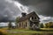 abandoned schoolhouse, with desks and blackboards still in place, against stormy sky