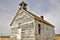 An abandoned Schoolhouse shows signs of age and deterioration.