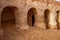 Abandoned set for the filming of Star Wars movie in the Sahara Desert against the backdrop of sand dunes.