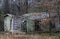 Abandoned shed with in a forest falling apart