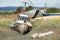 Abandoned shipwreck in a boat graveyard in Homer Spit Alaska