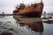 abandoned shipwreck near a disused dockyard