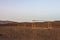 Abandoned soccer goal in the desert at sunset