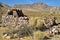 Abandoned stone house ruins in desert ghost town