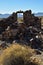 Abandoned stone house ruins in desert ghost town