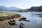 Abandoned and sunken wooden small boats along the river captured in Spain