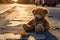 Abandoned teddy rests on street lost, a symbol of childhood