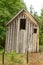 Abandoned tilting Wooden Lean To In Field Golden Oregon